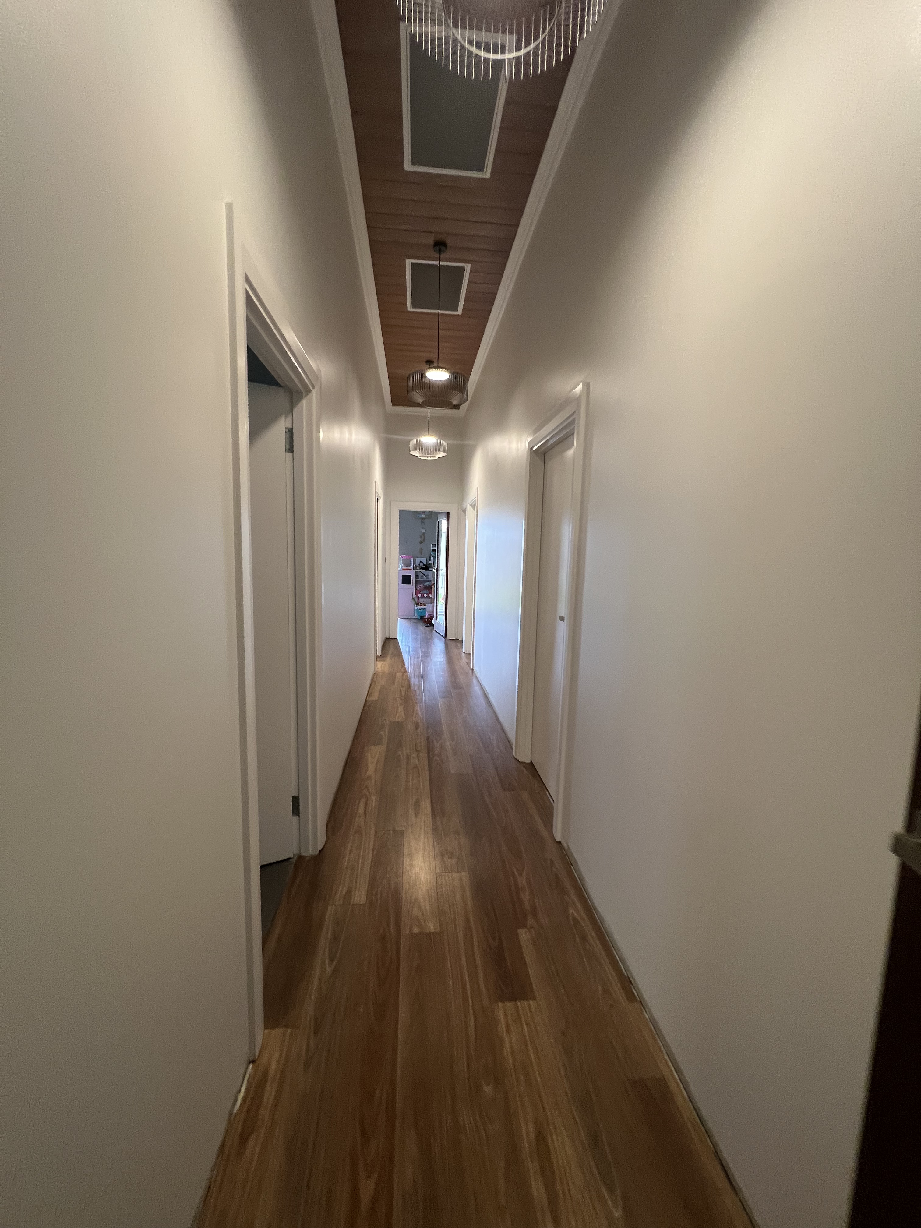 Lumina Painting long interior hallway